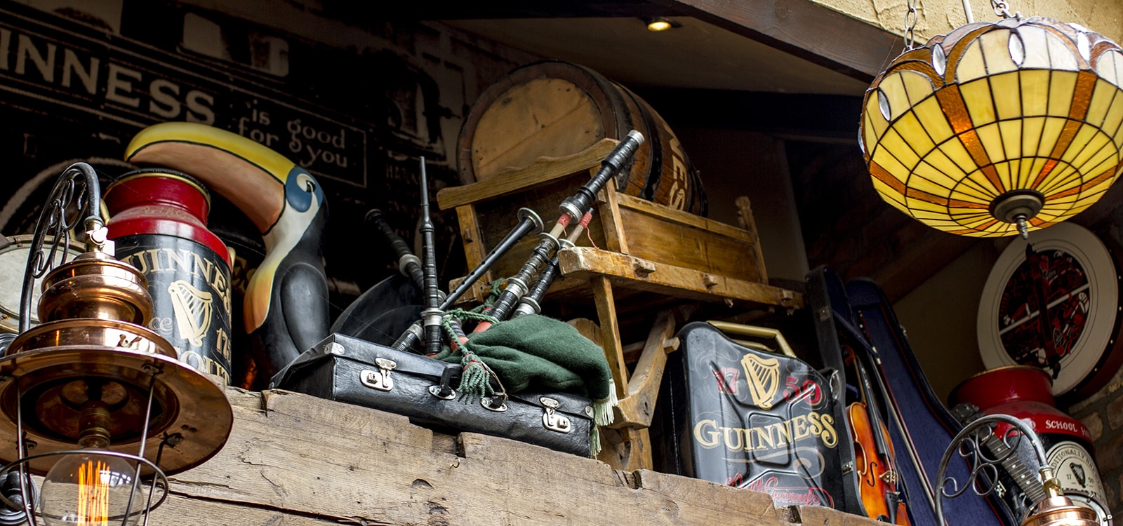 Memorabilia and stained-glass lamp inside The Old Schoolhouse