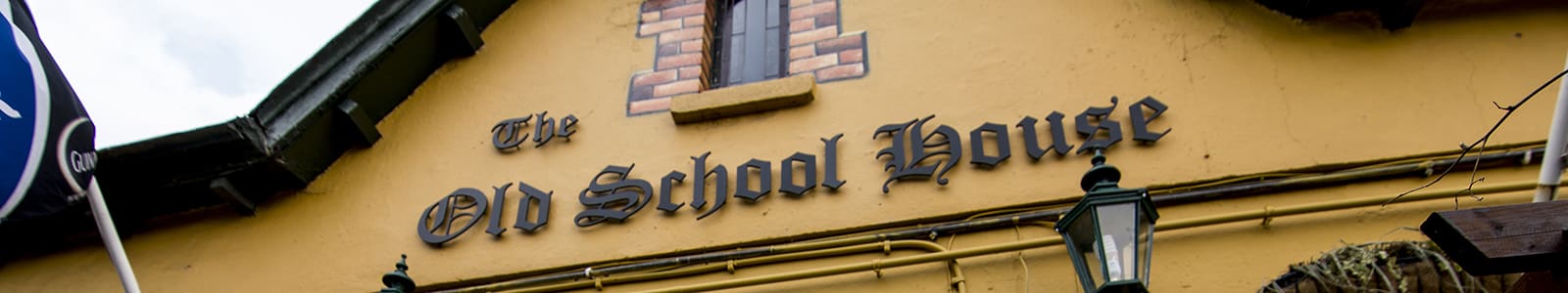The Old Schoolhouse sign
